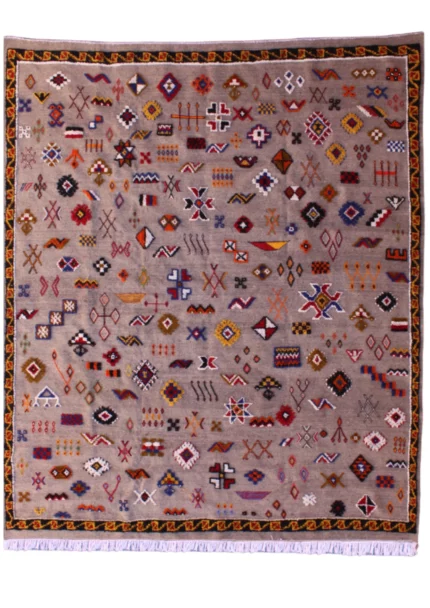 Unique Moroccan rug featuring a fusion of patterns and colors